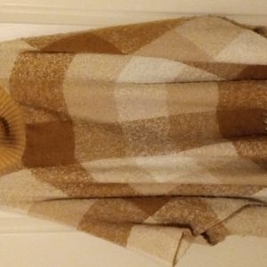 Light brown and beige turtle neck poncho open package never used